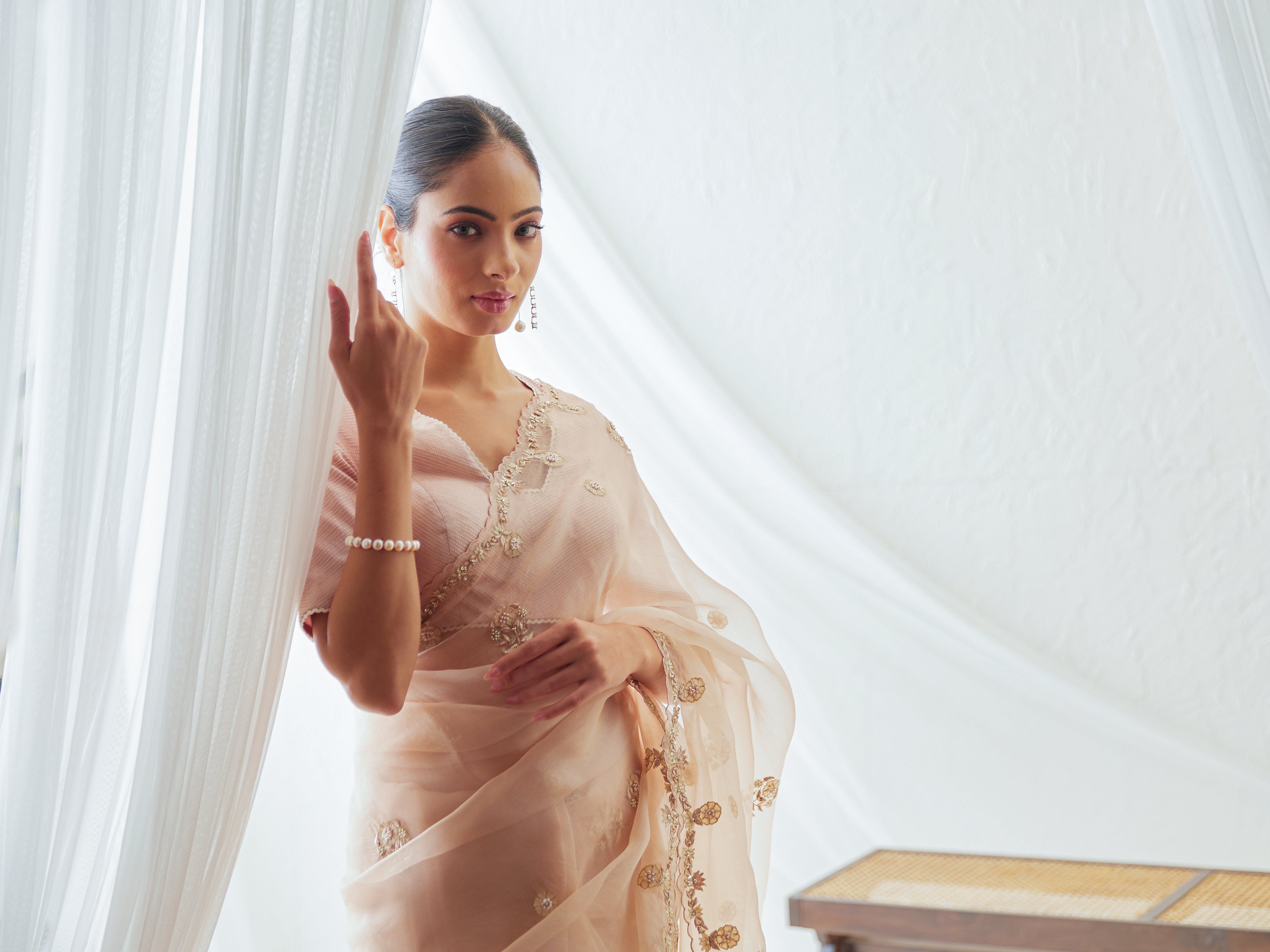 Reshami Raat peach nude saree